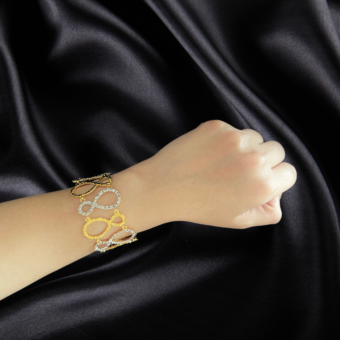 Mixed Gold Alternating Two-Tone Infinity Flat Statement Bracelet